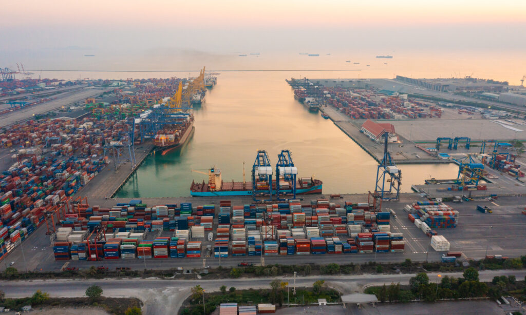 Aerial top view of container cargo ship in the export and import